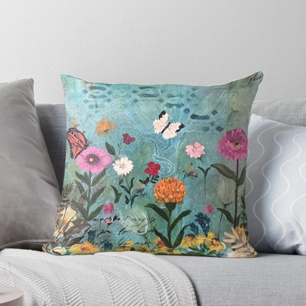Delightful day pillow featuring a vibrant floral garden design with colorful butterflies