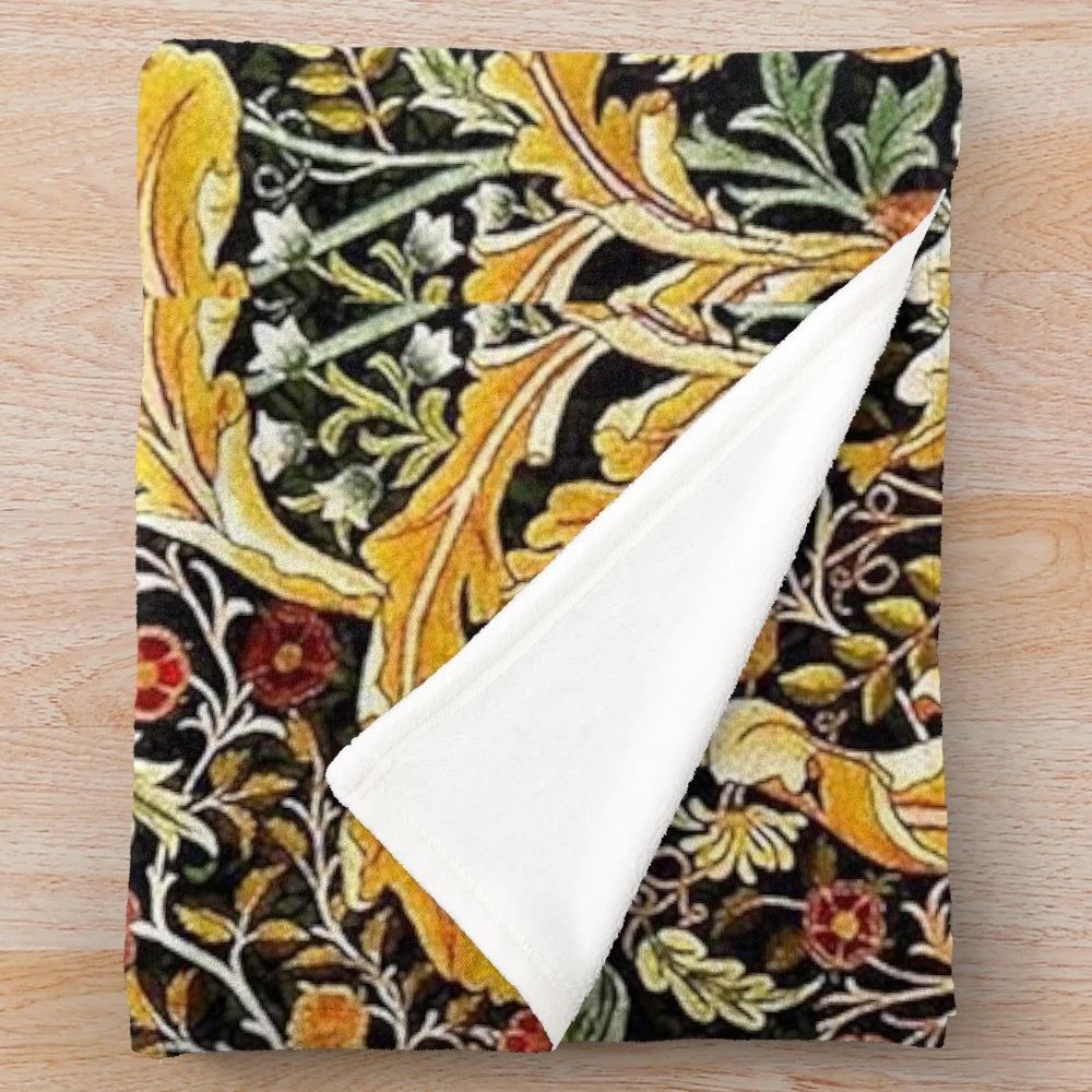 Plush blanket with a vibrant floral and owl pattern inspired by William Morris designs