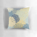 Vibrant floral pattern throw pillow in shades of yellow, gray, blue, and teal