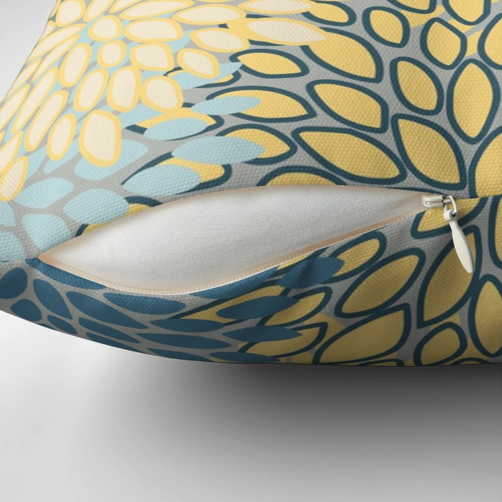 Vibrant floral pattern throw pillow in shades of yellow, gray, blue, and teal
