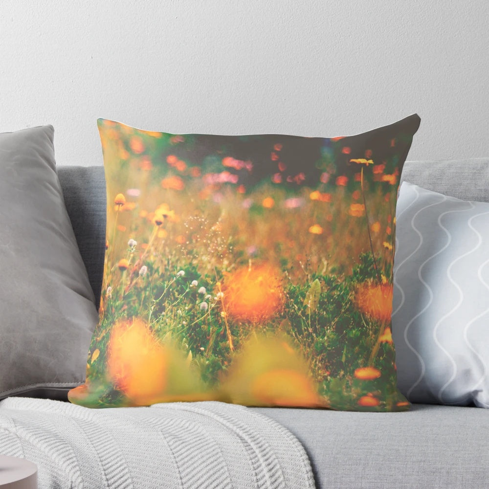 Colorful floral pillow featuring a vibrant array of summer flowers