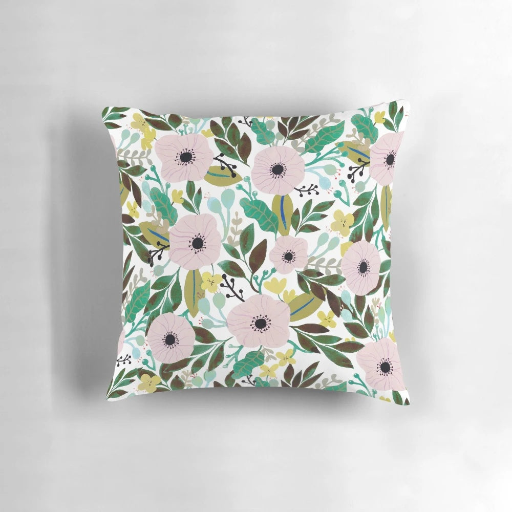 Unelmia 2 throw pillow featuring a vibrant floral pattern in a bohemian, tropical design.