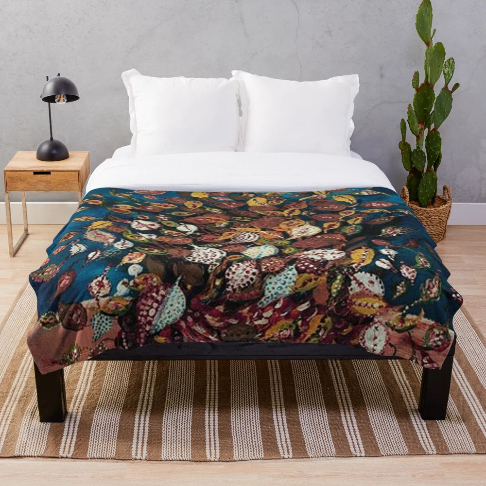 Plush blanket with a vibrant bouquet of leaves design inspired by the French artist Seraphine Louis