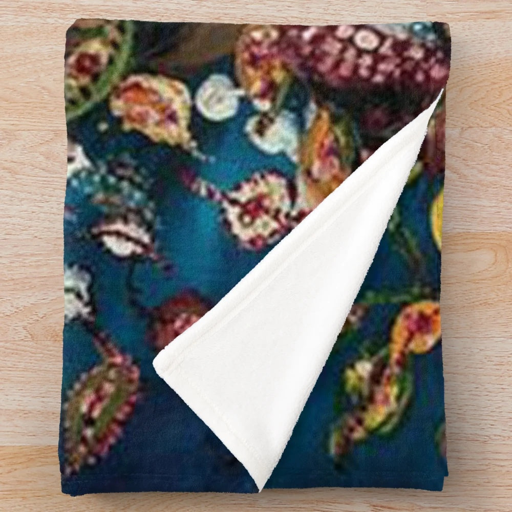 Plush blanket with a vibrant bouquet of leaves design inspired by the French artist Seraphine Louis