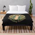Colorful floral print plush blanket with gardening and nature motifs