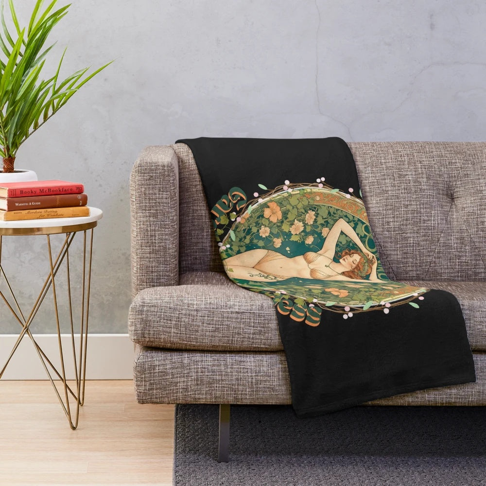 Colorful floral print plush blanket with gardening and nature motifs
