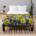 Floral plush blanket with sunflowers and monarch butterflies in a watercolor design