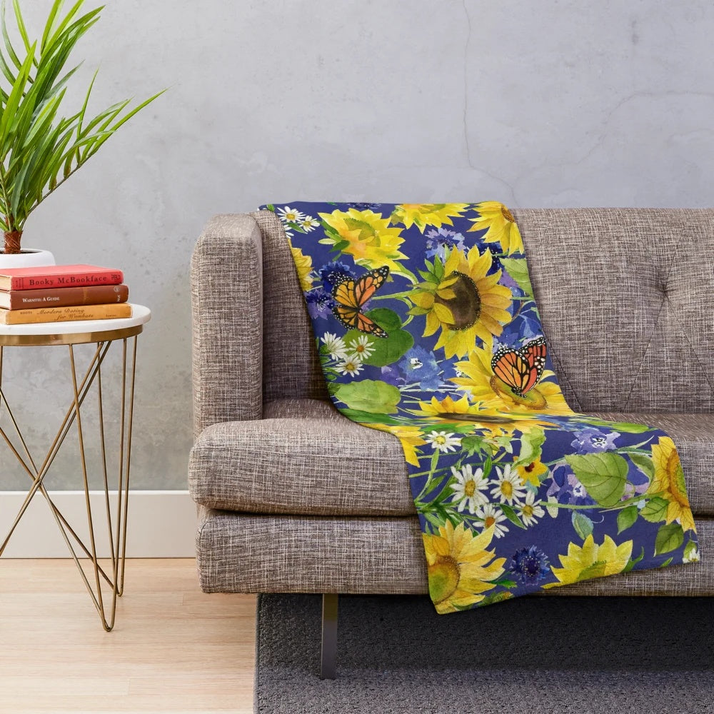 Floral plush blanket with sunflowers and monarch butterflies in a watercolor design