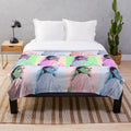 Colorful pop art style plush blanket featuring actress Florence Pugh