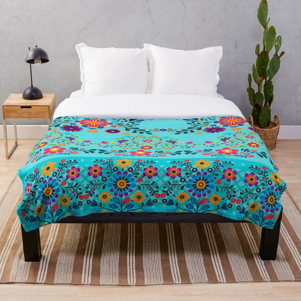 Colorful floral-patterned plush blanket representing Indian culture
