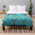 Colorful floral-patterned plush blanket representing Indian culture