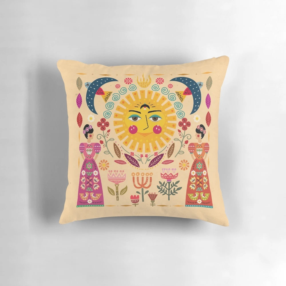 A decorative throw pillow featuring a vibrant collage-style design inspired by the iconic Mexican artist Frida Kahlo, including elements like birds, flowers, and the sun.