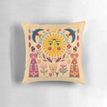 A decorative throw pillow featuring a vibrant collage-style design inspired by the iconic Mexican artist Frida Kahlo, including elements like birds, flowers, and the sun.