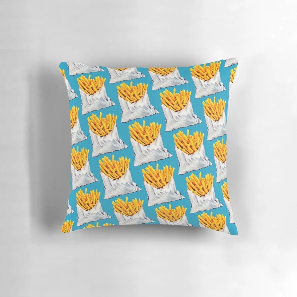 Colorful, patterned pillow featuring an illustration of french fries or potato chips