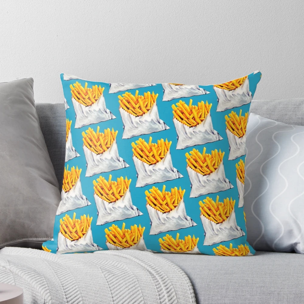 Colorful, patterned pillow featuring an illustration of french fries or potato chips