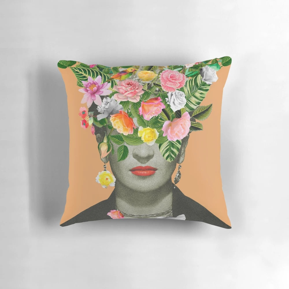 Colorful and artsy Frida Floral decorative pillow featuring a floral collage design in shades of orange.