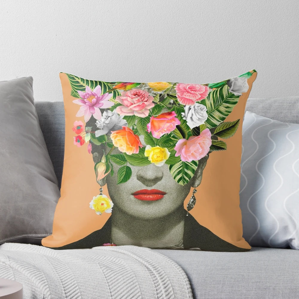 Colorful and artsy Frida Floral decorative pillow featuring a floral collage design in shades of orange.