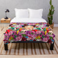 Frida-inspired plush blanket with floral and nature motifs