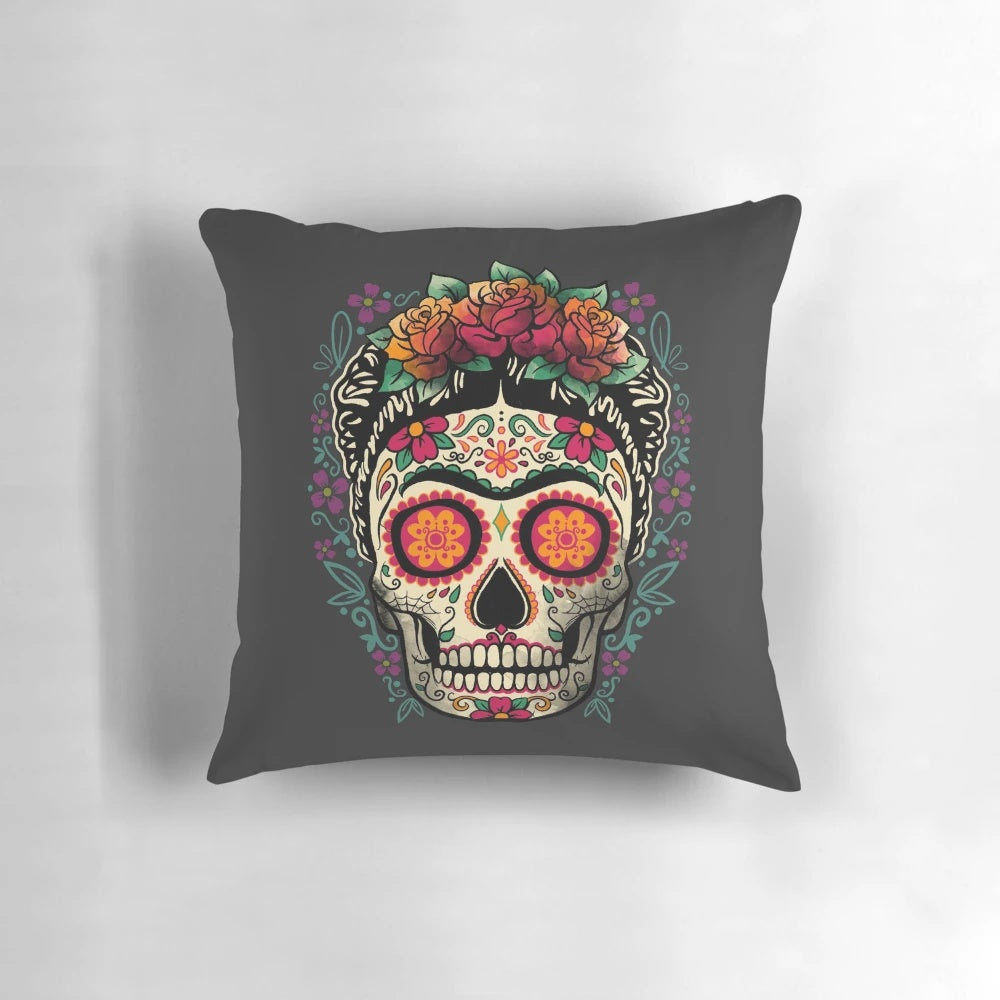 Colorful Frida Kahlo inspired pillow featuring a calavera (skull) design with floral elements