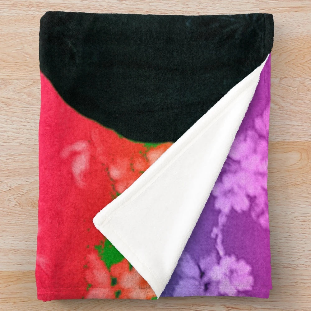 Colorful floral Frida Kahlo digital art design on a plush blanket