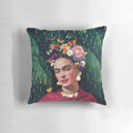 Colorful decorative pillow featuring a collage-style image of Frida Kahlo surrounded by tropical flowers and foliage.