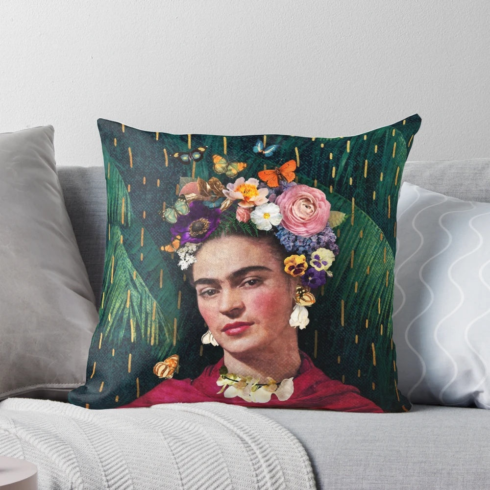 Colorful decorative pillow featuring a collage-style image of Frida Kahlo surrounded by tropical flowers and foliage.