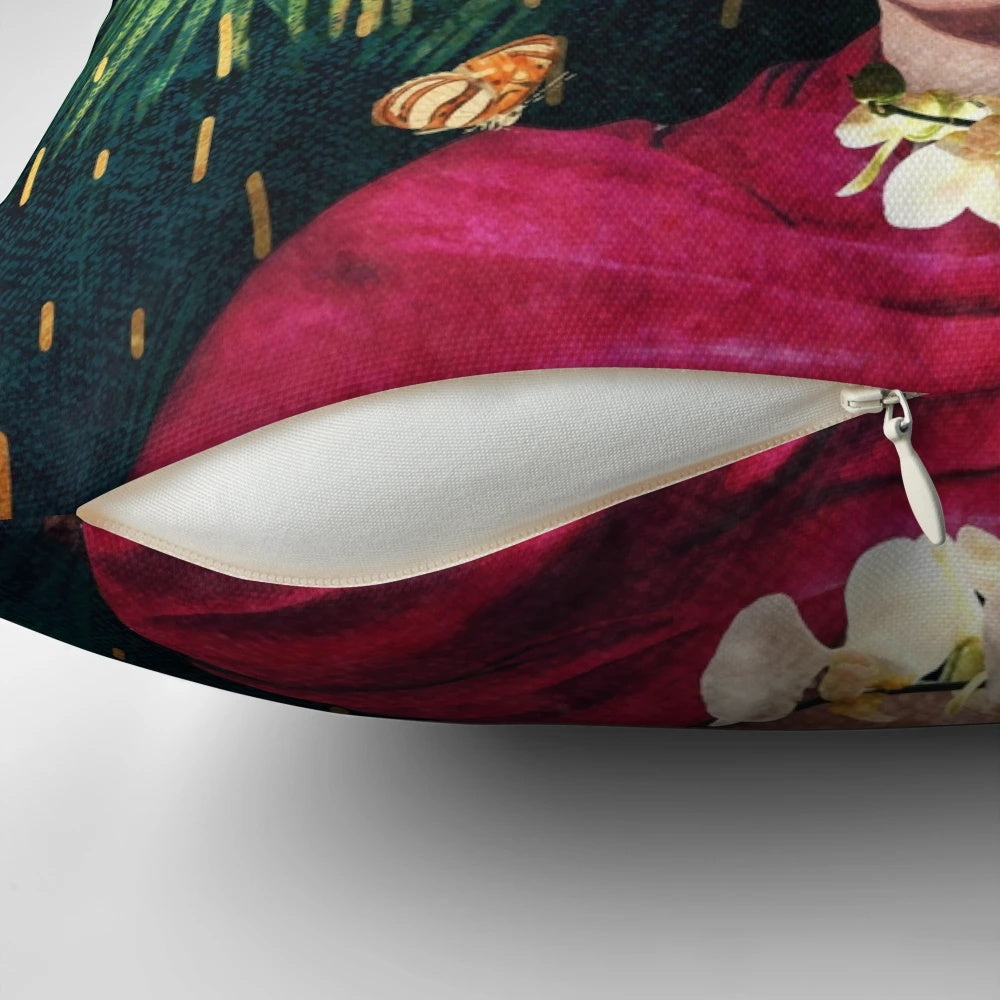 Colorful decorative pillow featuring a collage-style image of Frida Kahlo surrounded by tropical flowers and foliage.