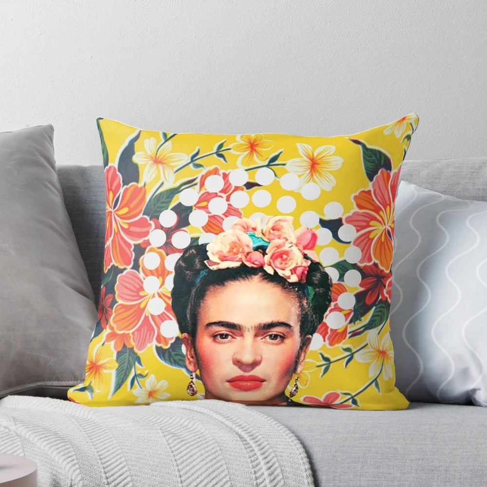 Colorful abstract floral pillow featuring Frida Kahlo-inspired design on ocher Mexican tablecloth background