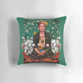 Colorful floral and bird-themed decorative pillow featuring the iconic portrait of artist Frida Kahlo.