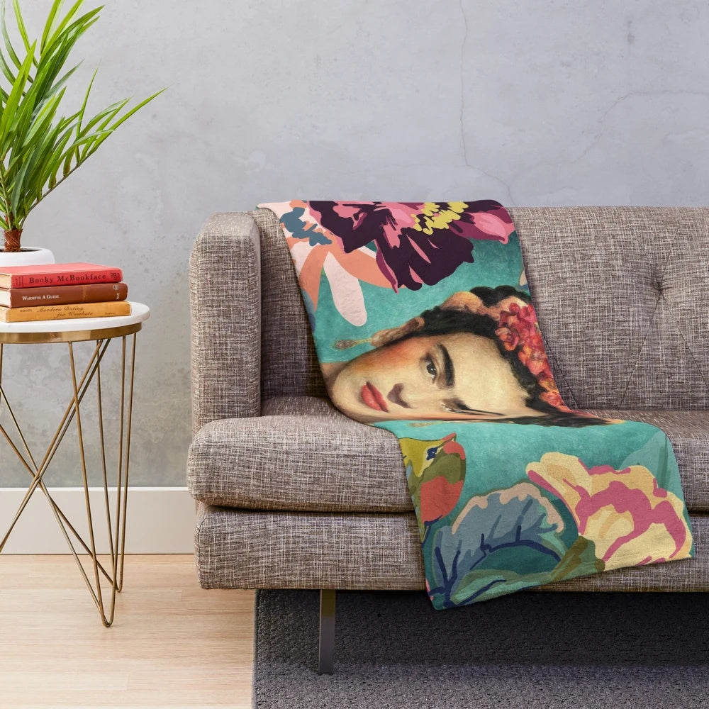 Colorful Frida Kahlo inspired plush blanket featuring the iconic artist's portrait