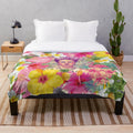 Frida Kahlo inspired plush blanket with vibrant colors and Mexican art design