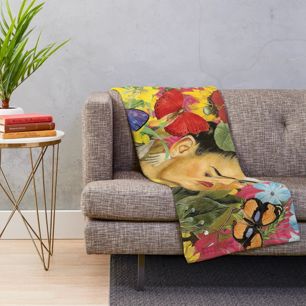 Colorful floral plush blanket featuring Frida Kahlo inspired imagery