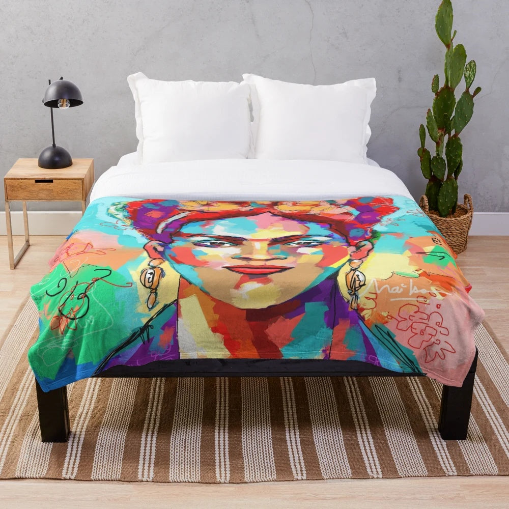 Colorful plush blanket featuring Frida Kahlo's iconic art