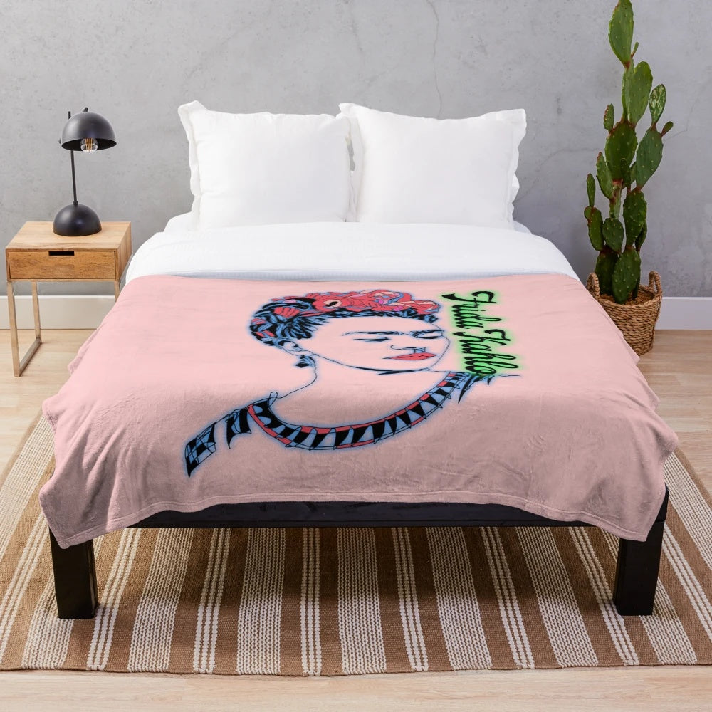 Colorful plush blanket featuring the iconic image of artist Frida Kahlo