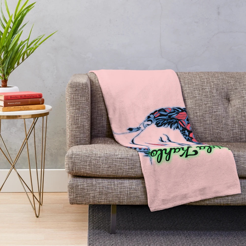 Colorful plush blanket featuring the iconic image of artist Frida Kahlo