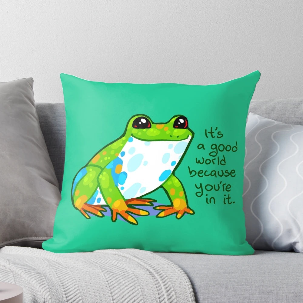 A colorful and whimsical frog-themed pillow with an inspiring message to brighten any space.
