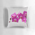 Closeup of a fuchsia magenta floral pillow with vibrant petals and blooms