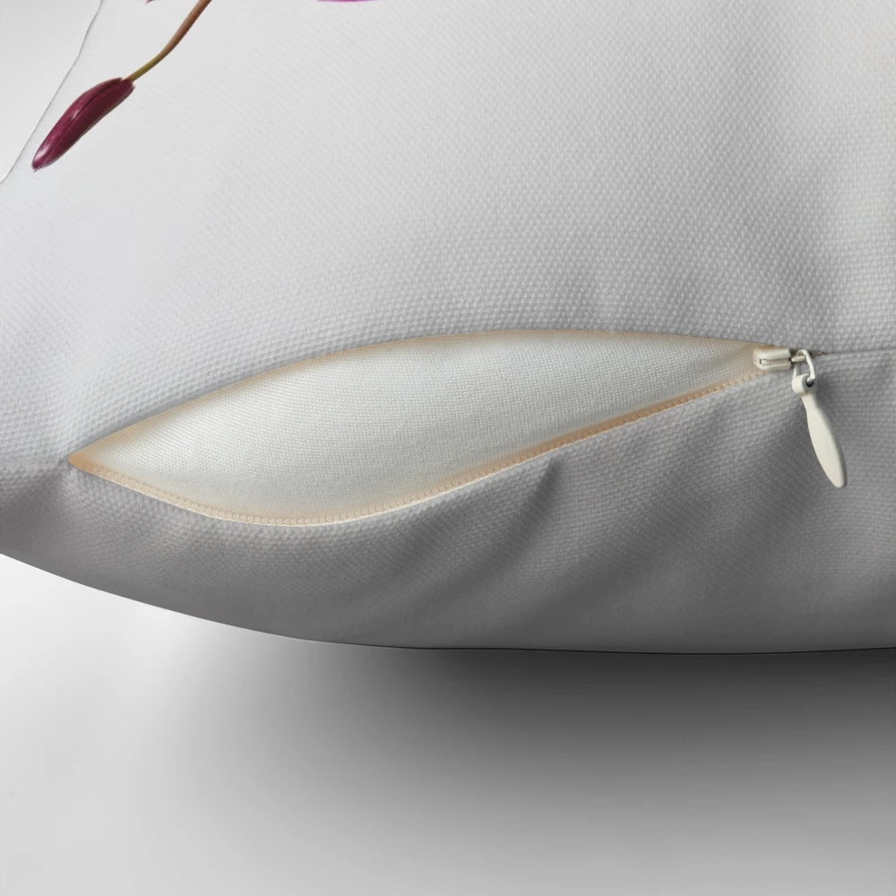Closeup of a fuchsia magenta floral pillow with vibrant petals and blooms