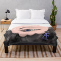 Colorful and abstract plush blanket with futuristic and trippy design