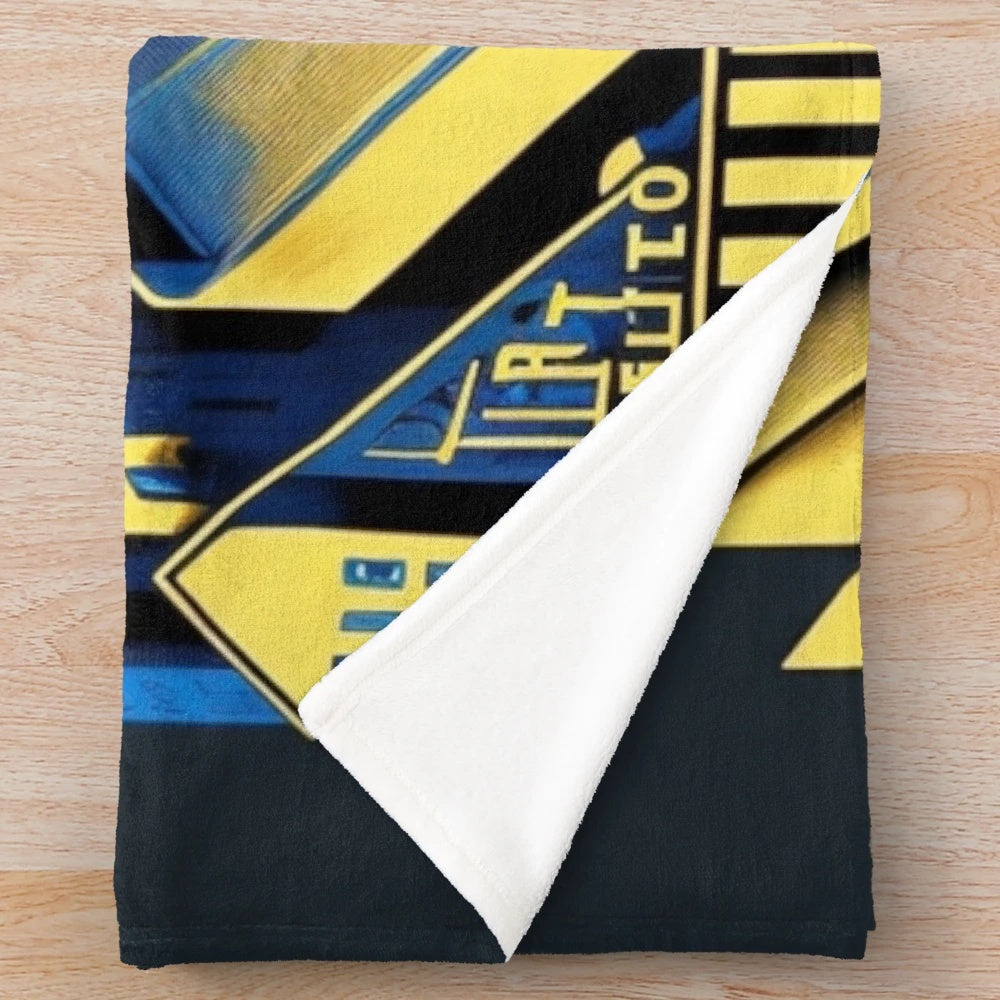 Colorful futuristic plush blanket with urban cityscape and movie theater elements