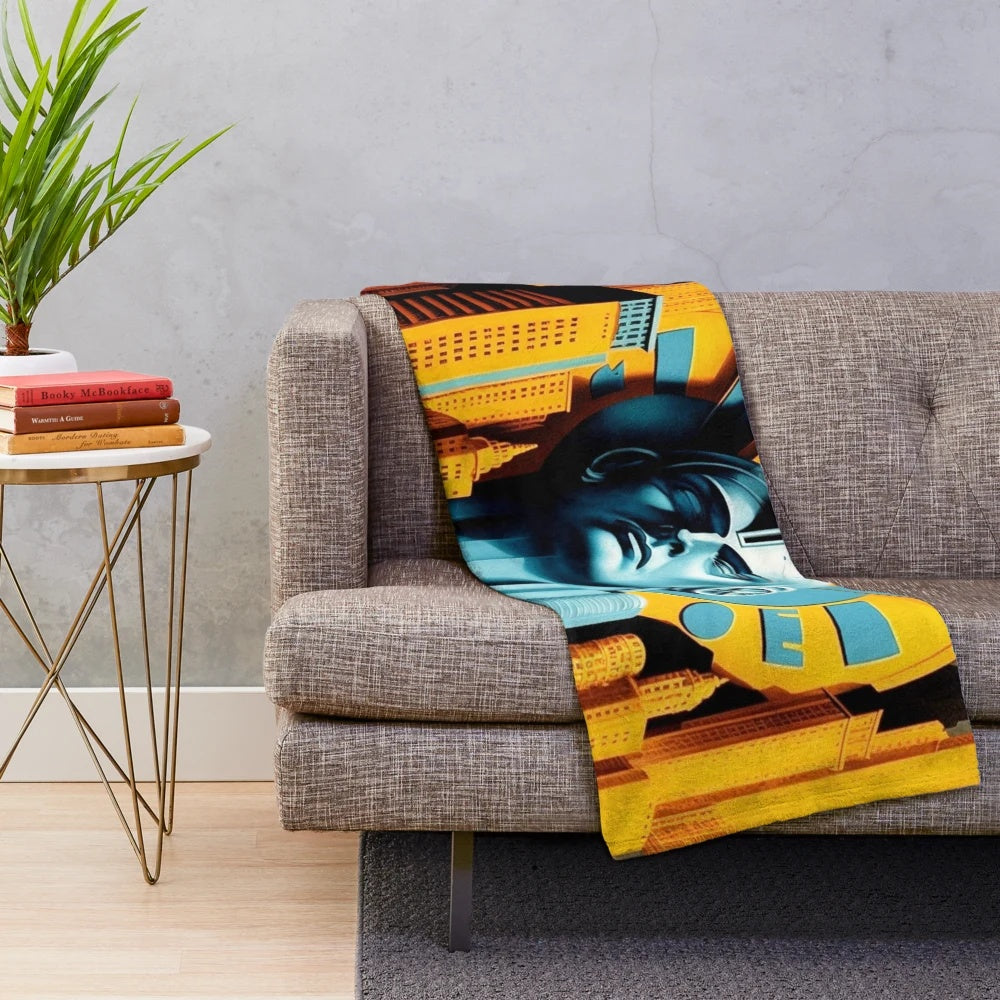Futuristic plush blanket with blue, yellow, and black colors inspired by a metropolitan cinema