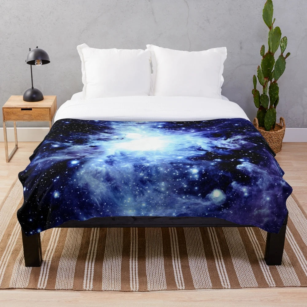 Galaxy blue plush blanket with Orion nebula design
