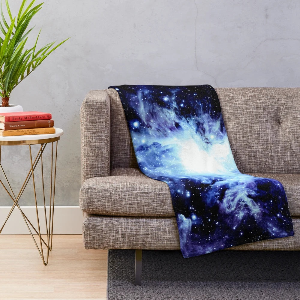 Galaxy blue plush blanket with Orion nebula design