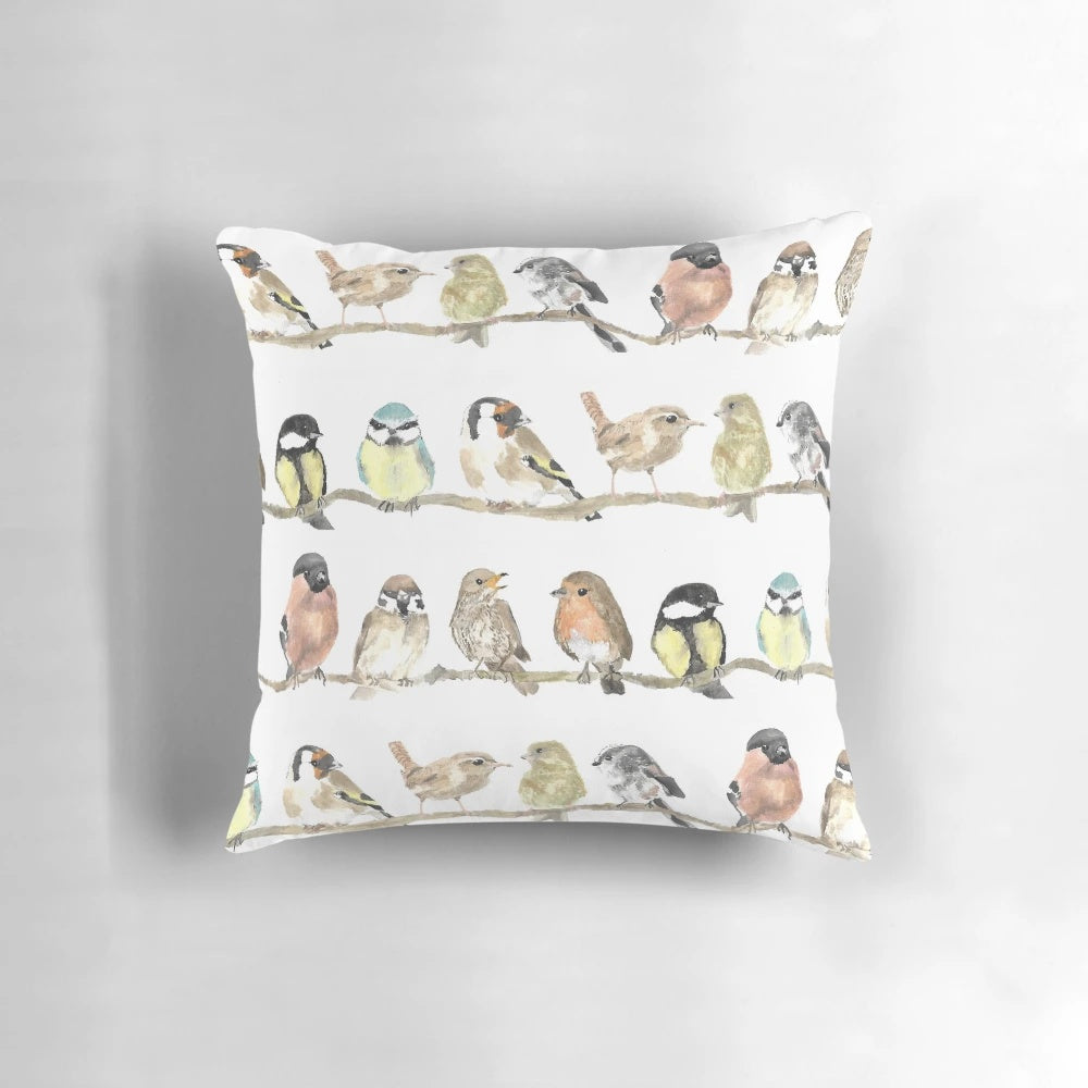 Colorful pillow featuring a beautiful dawn chorus of garden birds like robins and wrens