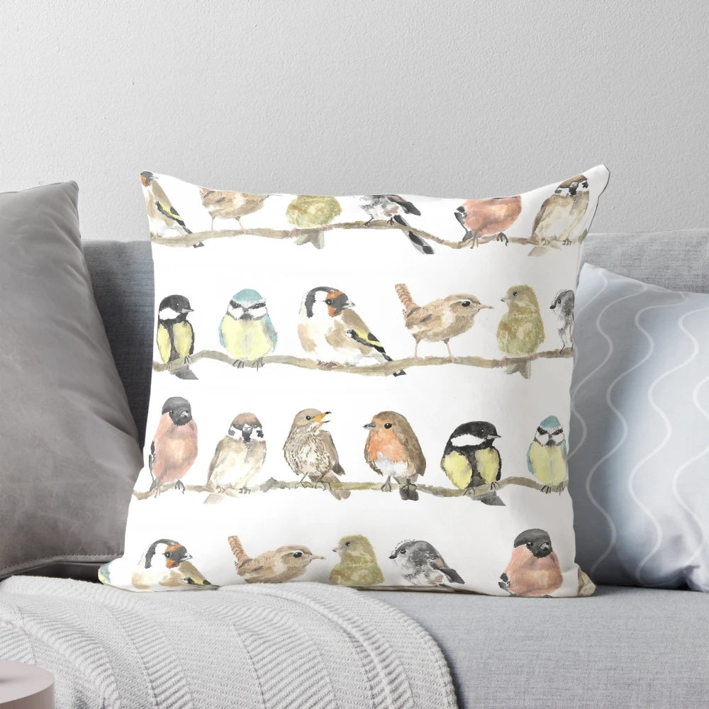 Colorful pillow featuring a beautiful dawn chorus of garden birds like robins and wrens