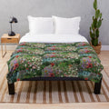 Colorful plush blanket featuring a garden scene with flowers