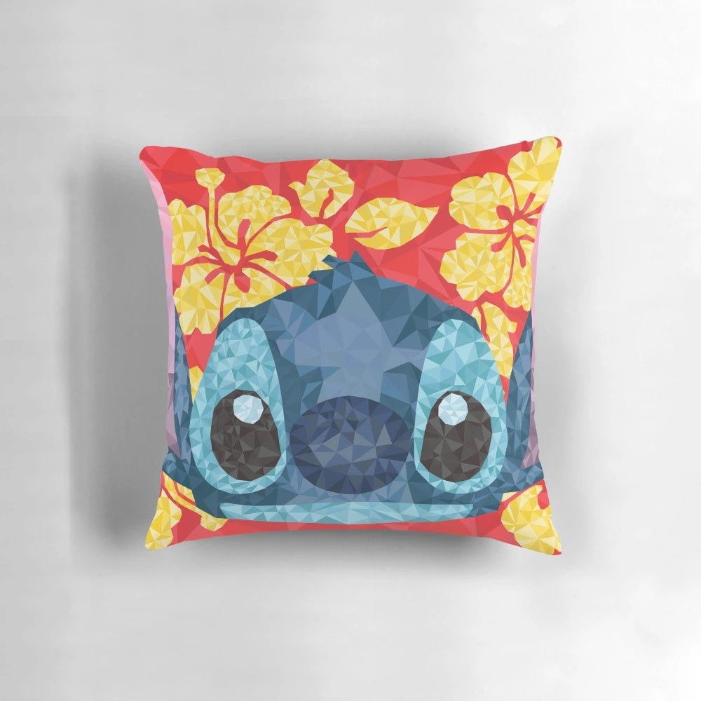 Geometric pattern pillow with Hawaiian flowers in red, blue, and yellow colors