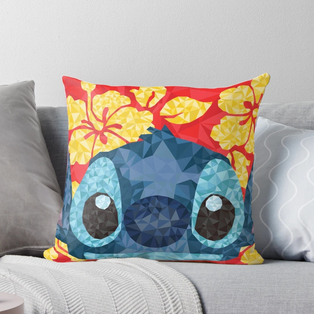 Geometric pattern pillow with Hawaiian flowers in red, blue, and yellow colors