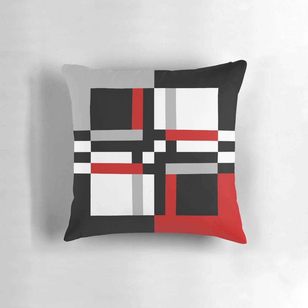 Decorative geometric pattern pillow with abstract stripe and square design in colorful retro vintage style