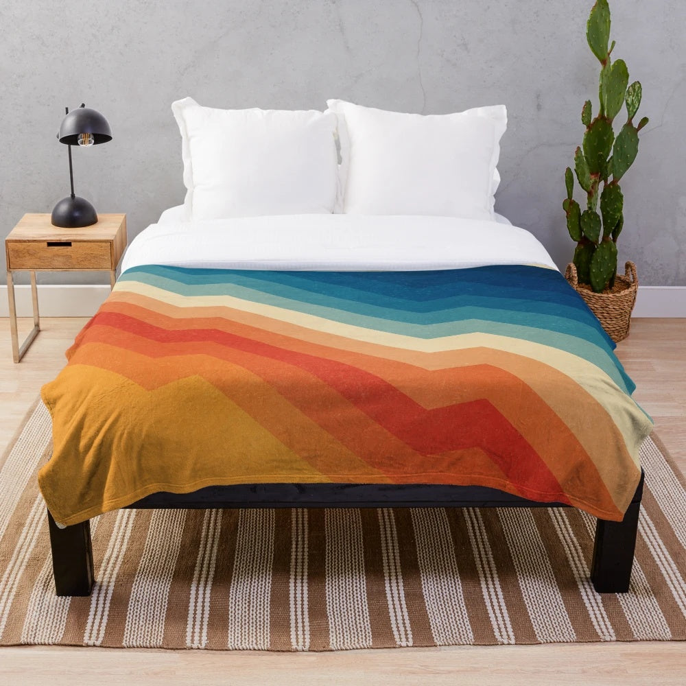 Plush blanket with vibrant geometric abstract pattern